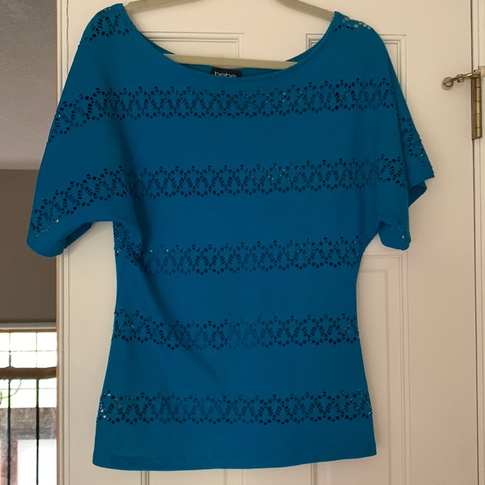 Bebe top. Side s. Made in usa. Great condition.